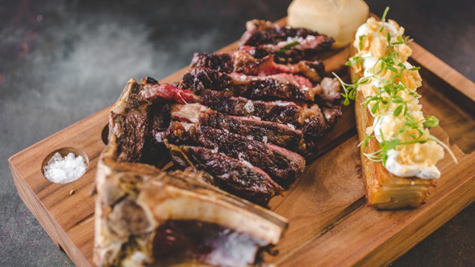 Sliced sirloin on a cutting board.